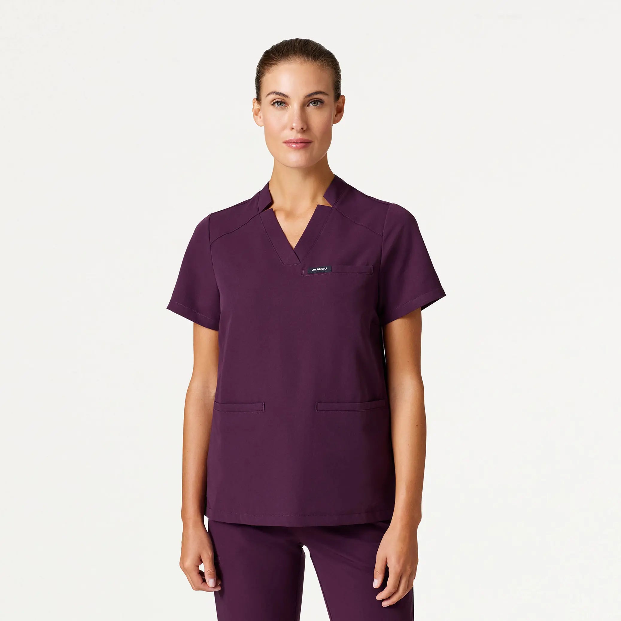 Jaanuu Women's Helia Notched V-Neck Scrub Top - Dark Amethyst